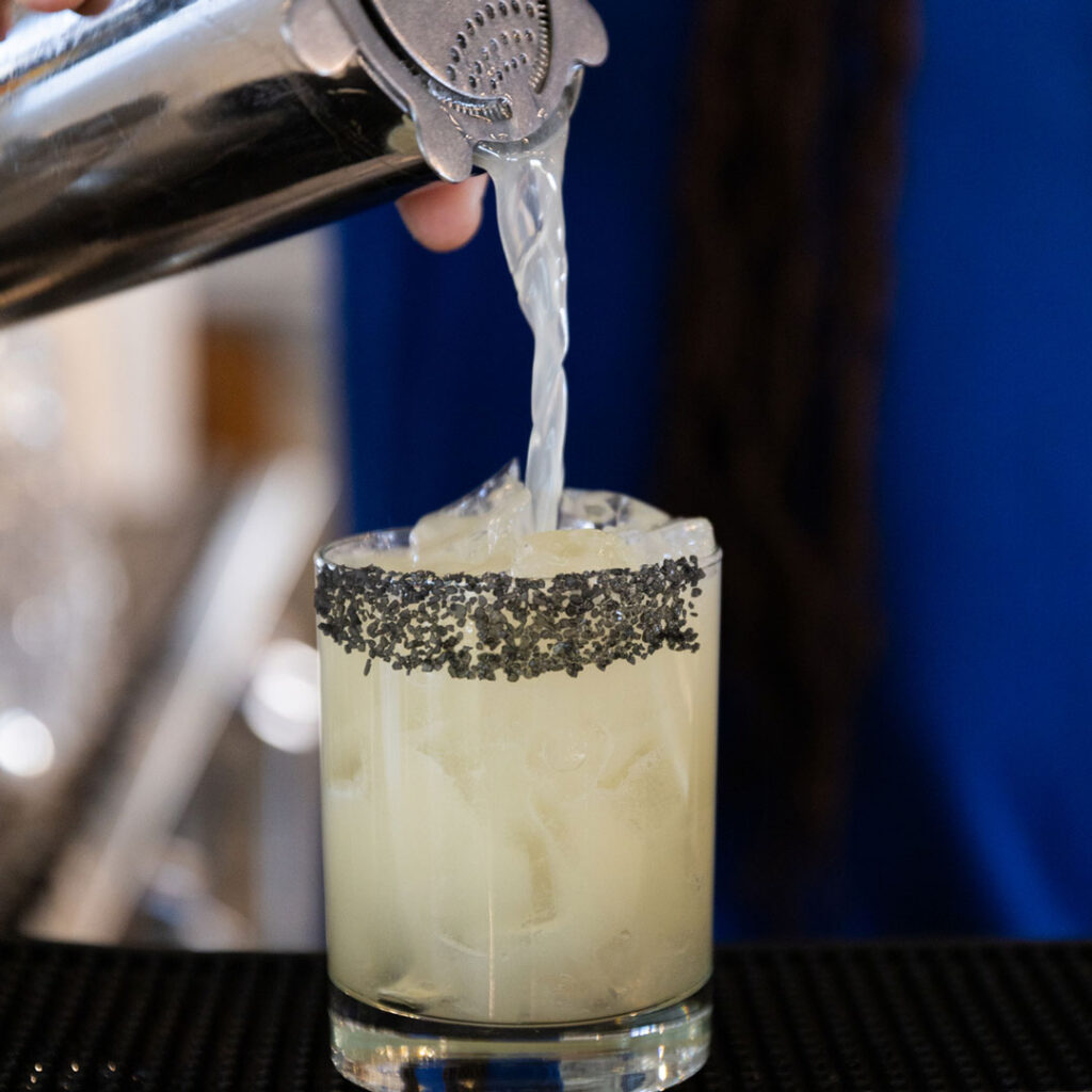 a happy hour margarita being poured at Parque 1055 in Santa Paula CA